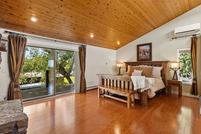 Primary suite with walk out balcony and fireplace | Image 27