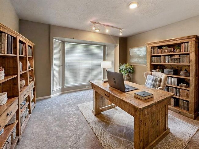 Flex area is connected to the primary bedroom-can be utilized as an office, nursey, gym or create a primary suite. VIRTUALLY STAGED | Image 6