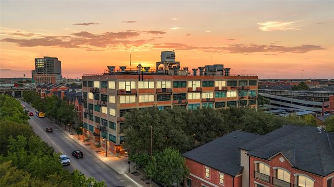 View of building exterior featuring a view of city | Image 6