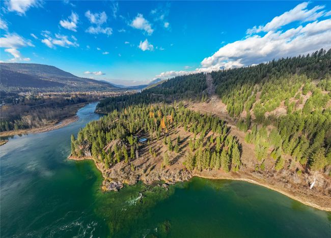 Aerial view featuring a water and mountain view | Image 10