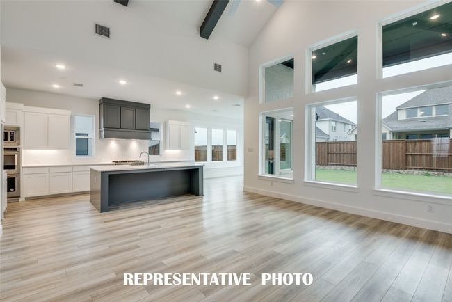 Walls of windows flood your new home with natural light. REPRESENTATIVE PHOTO. | Image 10