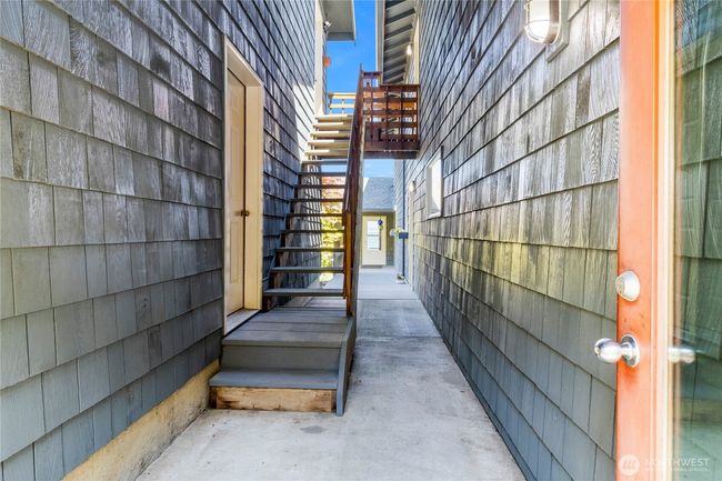 Stairs lead to studio/office and to the upstairs Rec Room. | Image 27