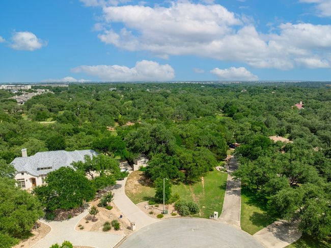 Aerial view of a heavily wooded area | Image 19