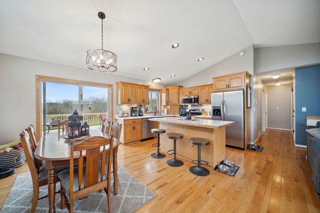 Fun dining room light, easy to get to the brand new deck, and good cabinet space. | Image 9