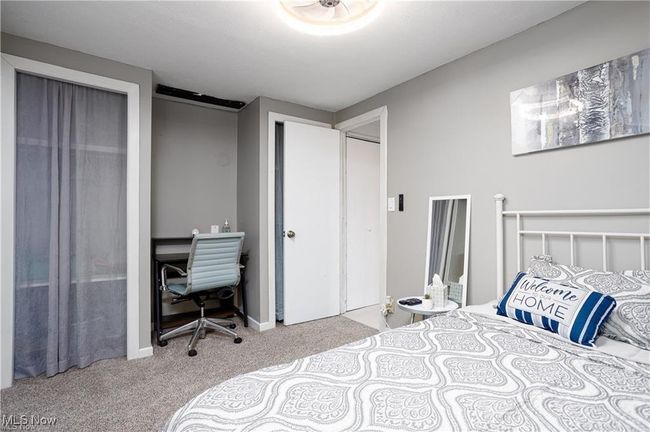 Bedroom with baseboards and carpet flooring | Image 13