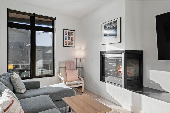 View of living room | Image 12