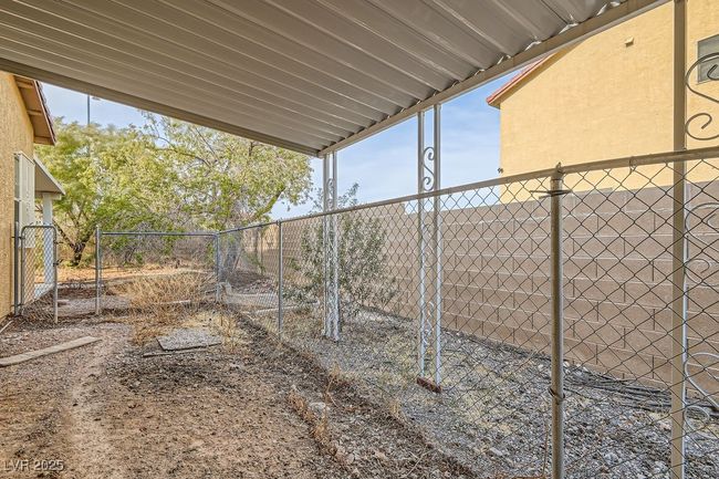 View of yard with fence | Image 28