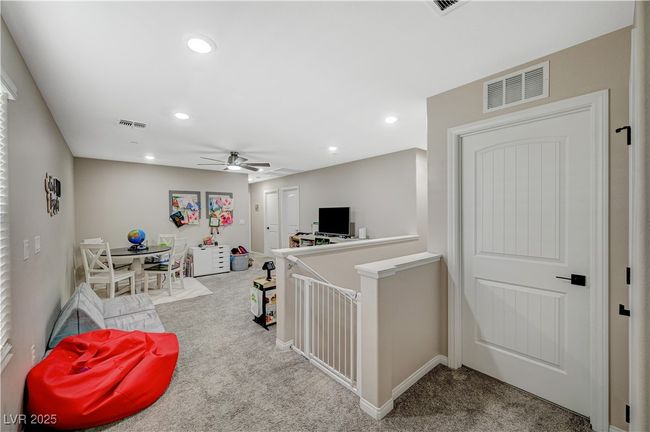 Game room featuring carpet floors, a ceiling fan, recessed lighting, and baseboards | Image 33