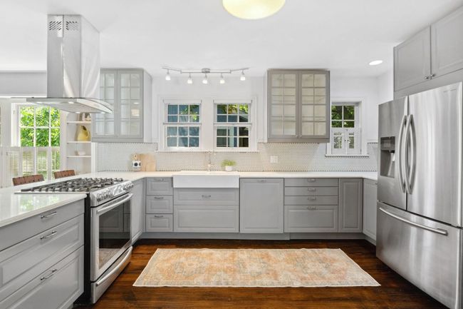 It's rare to find an older house with decent storage, but this one has cabinets for days. Oh, and that farmhouse sink! | Image 6