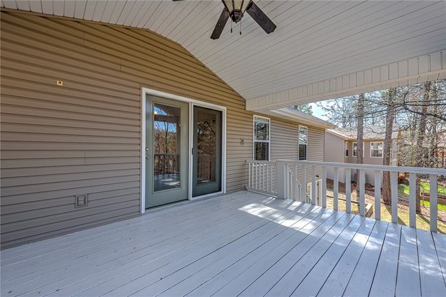 Deck has steps leading to basement. | Image 24