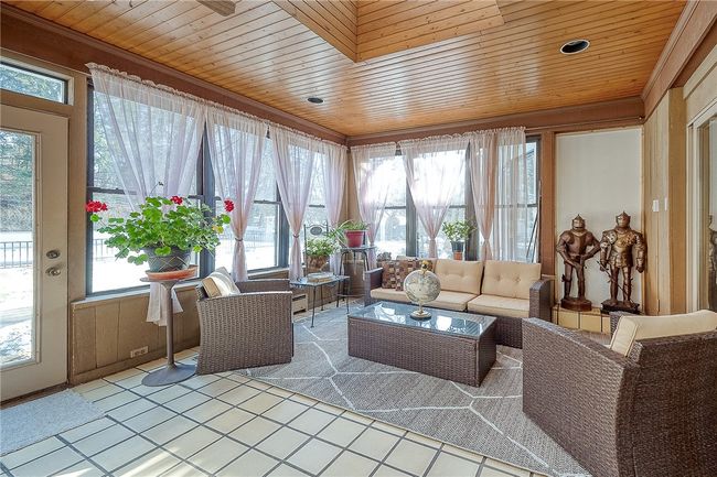 3 Season Room is off the family room. | Image 12