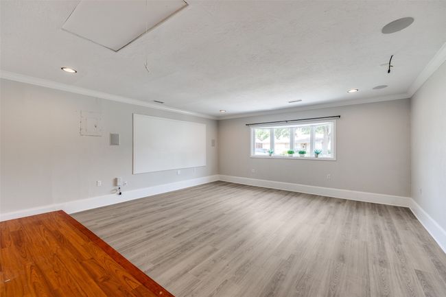 Converted garage for media or family gatherings. | Image 13