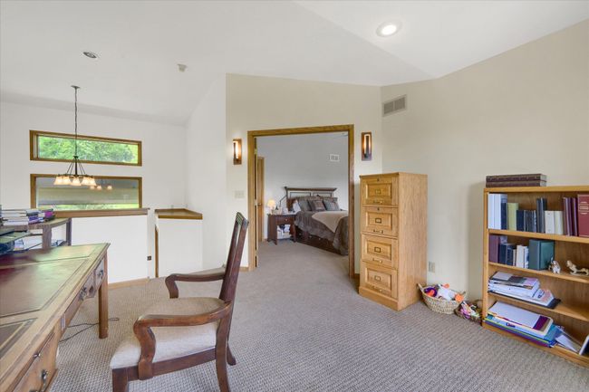 Office Just Off The Primary Bedroom Overlooks The Living Room. | Image 19