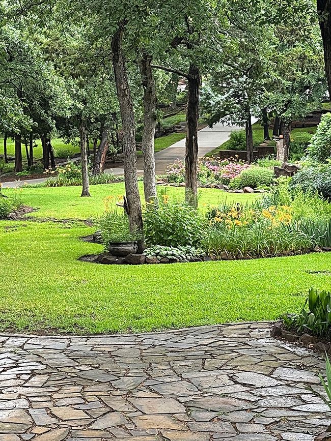 View of beautifully landscaped yard. | Image 40