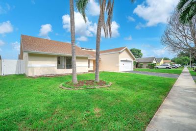 8311 Nw 51st Ct, House other with 4 bedrooms, 2 bathrooms and null parking in Lauderhill FL | Image 3