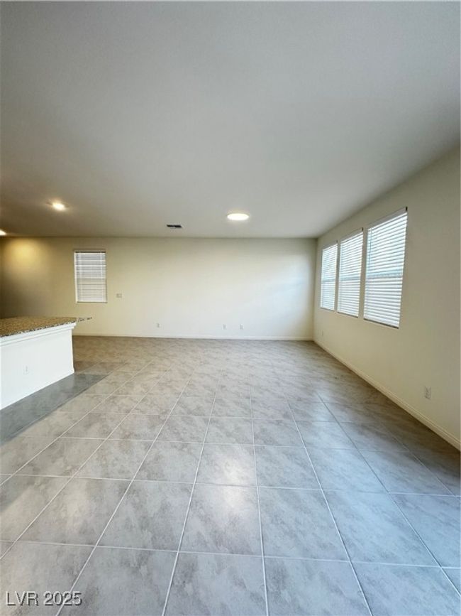 Empty room featuring recessed lighting, baseboards, and light tile patterned floors | Image 5