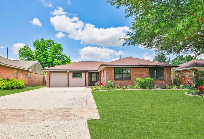 Notice the custom pavers & hardscapes throughout the property *Digitally enhanced photo | Image 35
