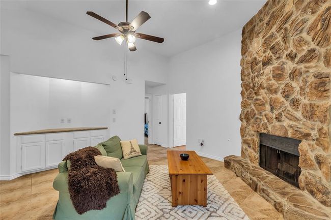 There is water connection under the cabinets. It was originally the bar area. | Image 10