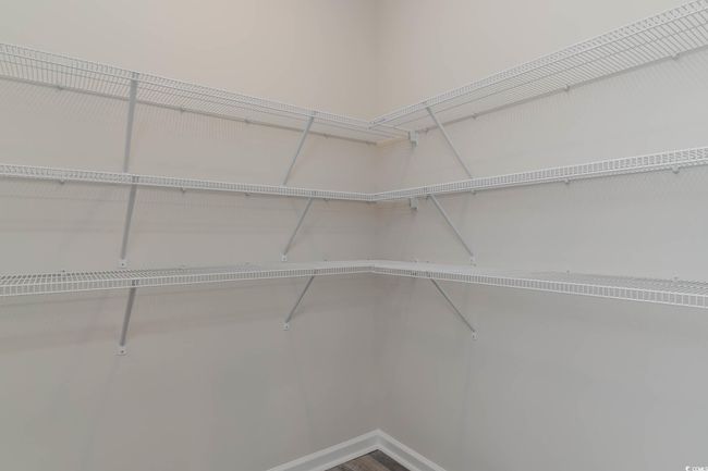 View of walk in closet | Image 7
