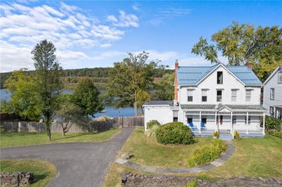 Street view of the house and lake | Image 1