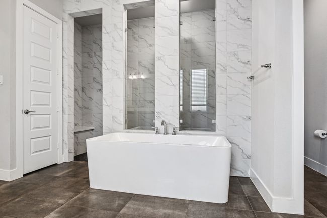 Full bathroom featuring a soaking tub | Image 19