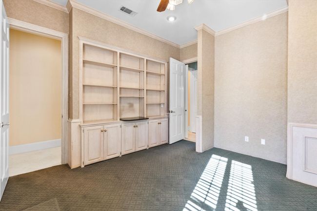 Study with so much storage space, cabinets and shelves. | Image 39