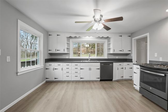 Large windows, new LV flooring and new S/S smudge proof appliances. | Image 16
