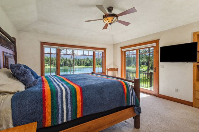 Upper level with lake and mountain views | Image 31