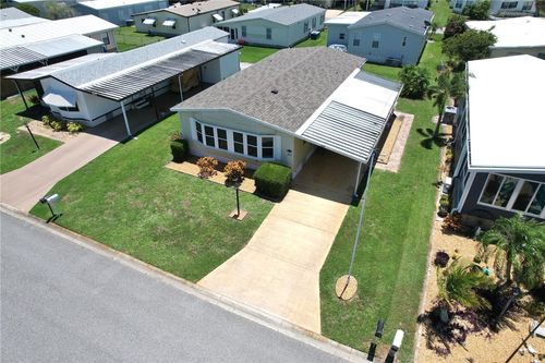809 Oleander Cir, Barefoot Bay, FL, 32976-7100 | Card Image