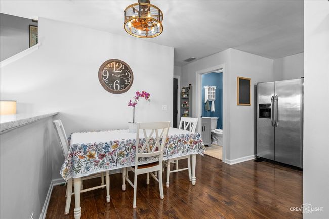 Eat-in kitchen with table area. | Image 11