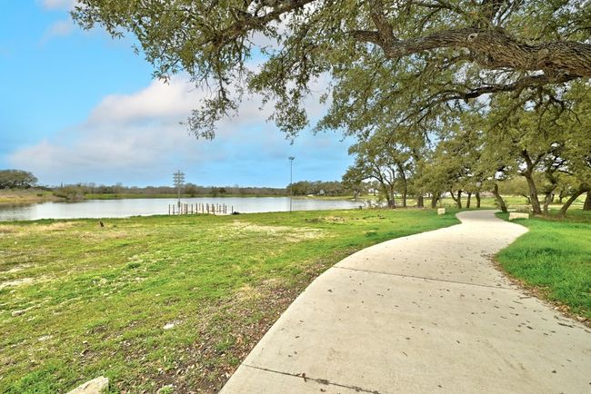 View of home's community with a water view and a yard | Image 36