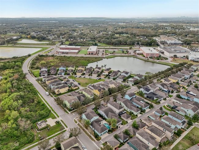 LARGE CORNER LOT ADDS EASY PARKING AND ACCESS! | Image 60