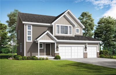 View of front of property with a garage and a front lawn | Image 1