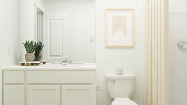 Bathroom with vanity and a shower with shower curtain | Image 11