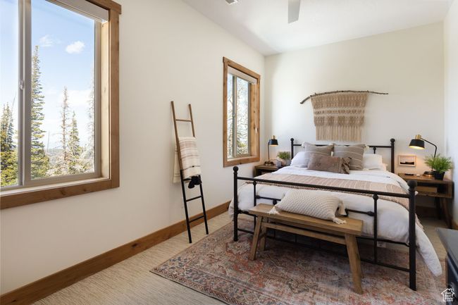 Bedroom featuring baseboards and a ceiling fan | Image 22