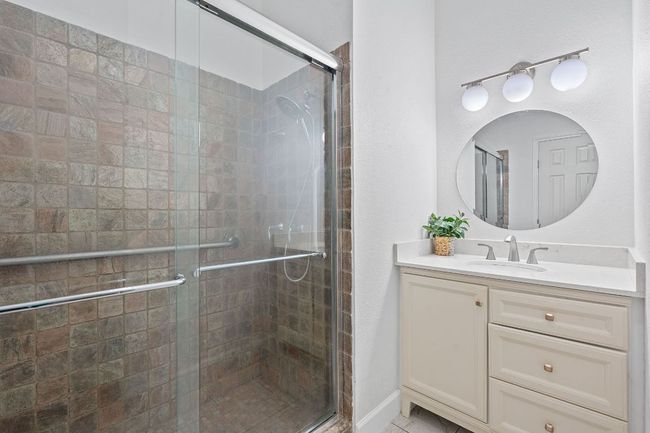 Full bath with a shower stall and vanity | Image 28