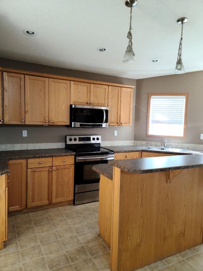 401 4 St Ne, House detached with 3 bedrooms, 3 bathrooms and 4 parking in Mclennan AB | Image 6