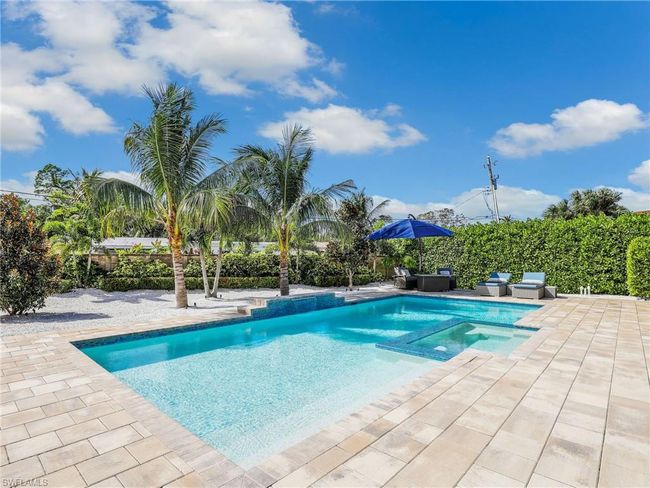 View of pool featuring a patio area | Image 36
