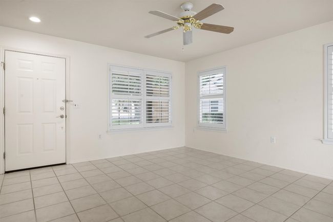 Entry with ceiling fan and recessed lighting | Image 23