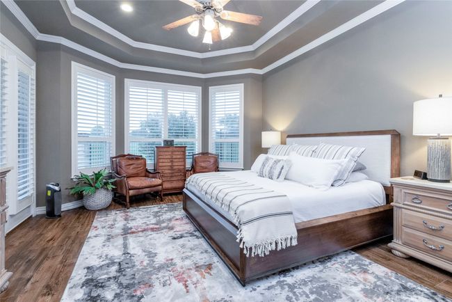 Primary Bedroom featuring ornamental molding, and coffered ceiling. | Image 17