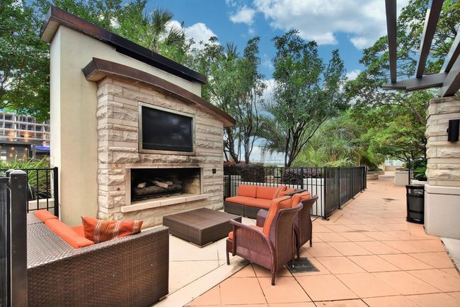 View of patio featuring an outdoor living space with a fireplace | Image 20
