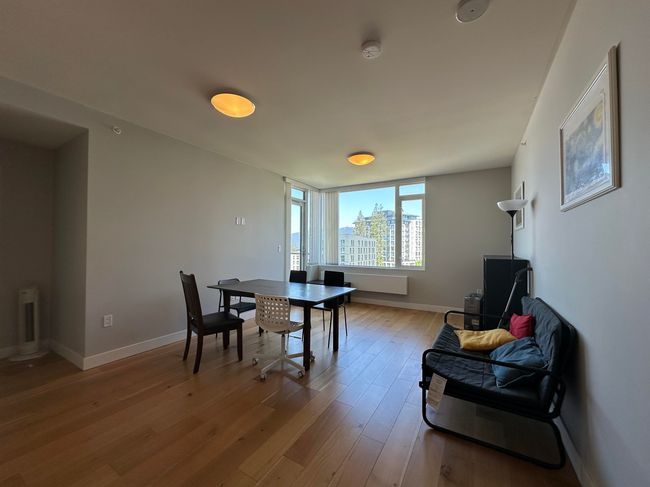 Dining area with wood finished floors and baseboards | Image 17