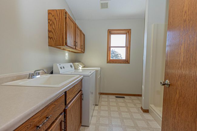 24-Main Floor Laundry and Bath 2.jpg | Image 24