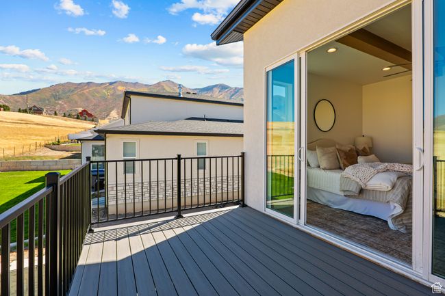 Wooden terrace featuring a mountain view | Image 44