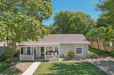 View of front of property featuring a front yard and covered porch | Image 2