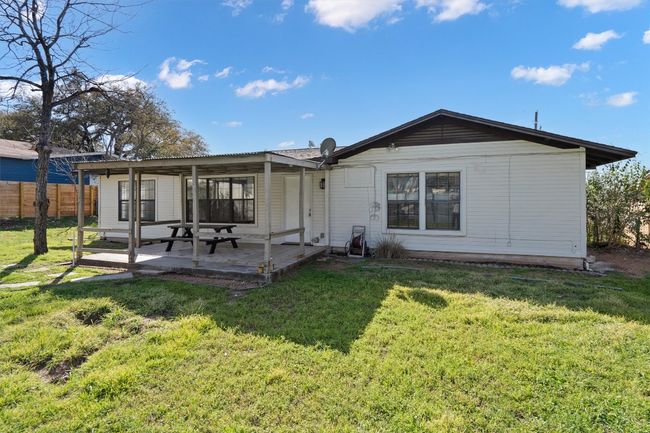 Rear view of property with a patio, a yard, and fence | Image 31