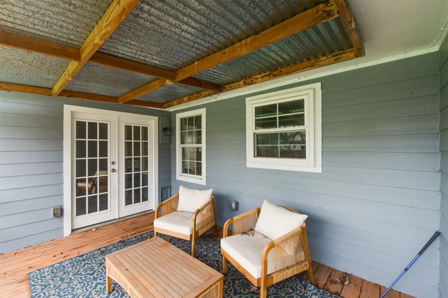 Wooden deck featuring french doors | Image 21