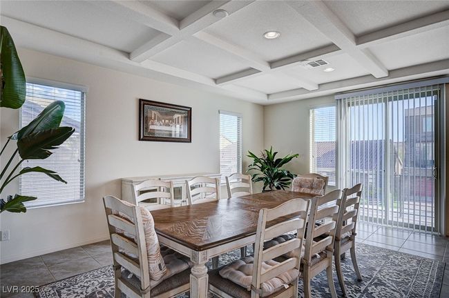 Tiled Dining Room featuring Beamed Ceiling | Image 18