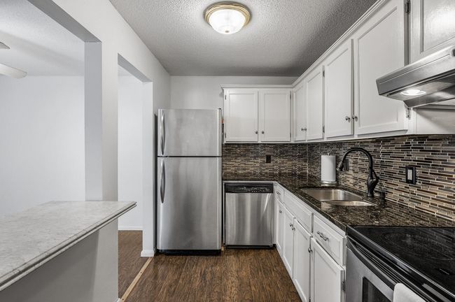 A closer look at your updated kitchen. Stainless steel appliances create a clean, cohesive look that is easy to maintain. | Image 11