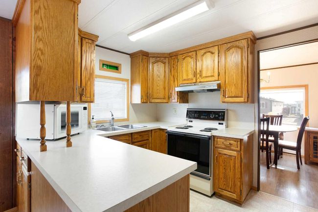 23 - 99 Arbour Lake Road Nw, House other with 3 bedrooms, 2 bathrooms and 2 parking in Calgary AB | Image 6